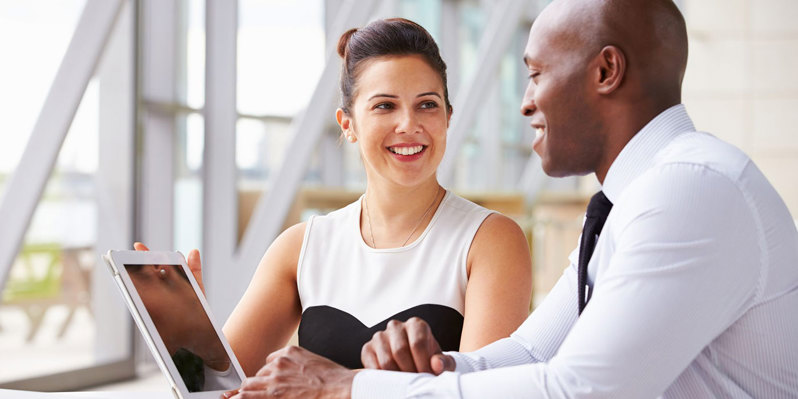 Human resources professional talking with employee